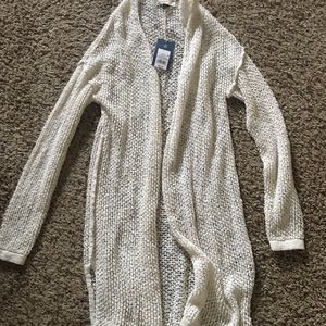 Cream universal thread tunic.